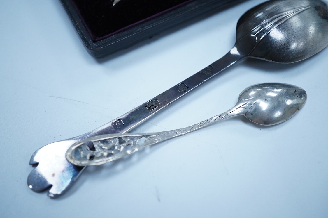 A collection of small silver to include a George V engraved concave card case, I. S. Greenberg & Co, Birmingham, 1912, 80mm, a cased late Victorian small bread fork, a modern mounted glass posy vase, an Irish nut dish, a